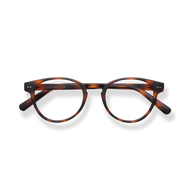 
Tortoiseshell round reading glasses with a dark bridge and glossy frames.