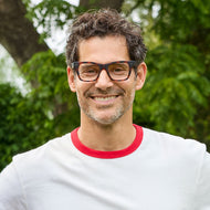 
A person wears square tortoise frames with clear lenses.