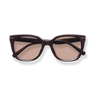 
Dark tortoiseshell cat-eye sunglasses with brown gradient lenses and silver stud details.