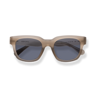 
Beige square sunglasses with dark blue lenses and a translucent frame.