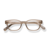 
Translucent beige rectangular eyeglasses with tortoiseshell arms and silver rivet details.