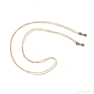 
A gold chain with black loop ends.