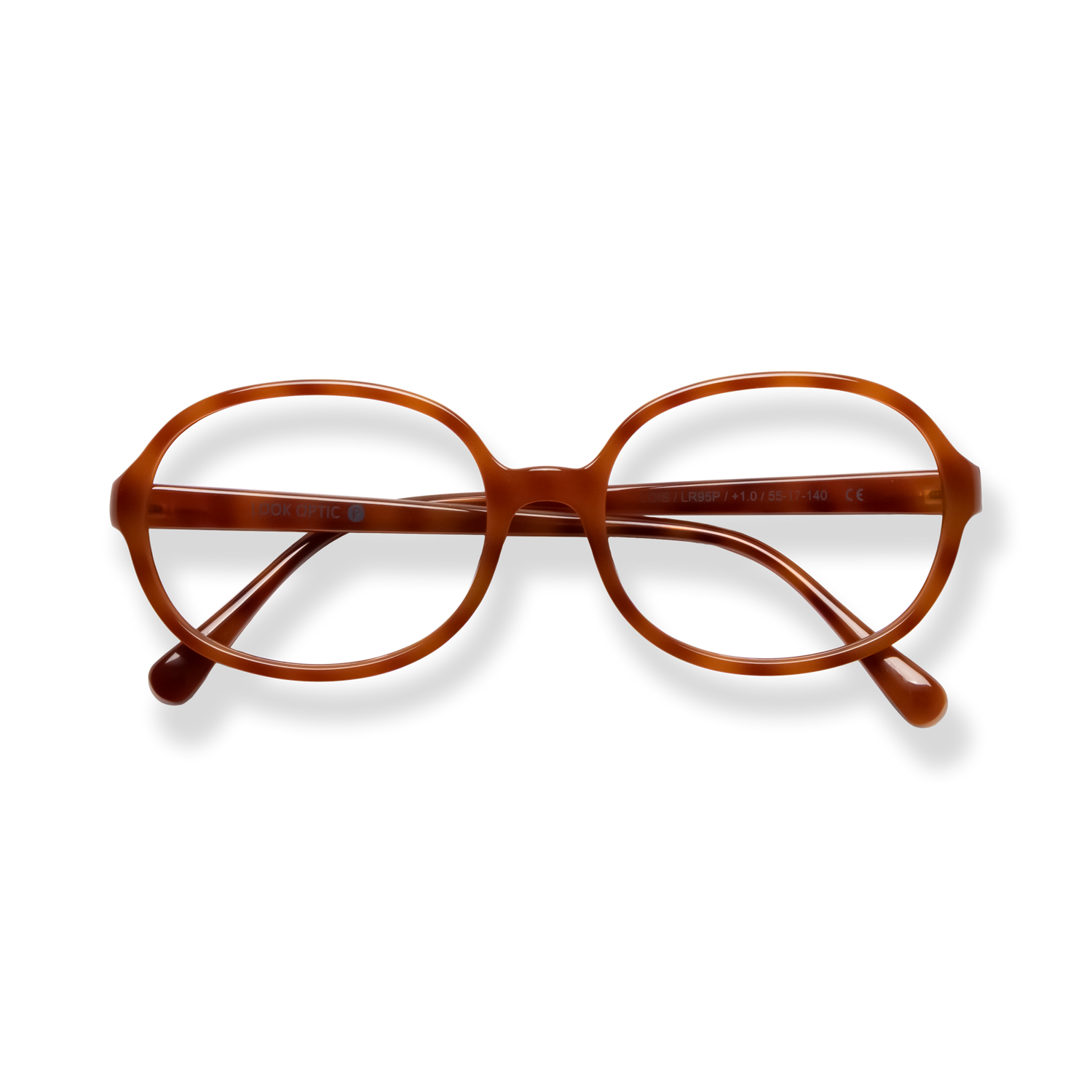 
Brown tortoiseshell oval reading glasses with slim arms on a black background.