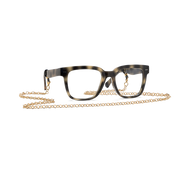 
Glossy dark tortoiseshell glasses with a square shape and clear lenses.