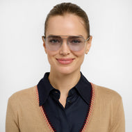 MU35PSIB10, MU35PSIB15, MU35PSIB20, MU35PSIB25, MU35PSIB30 - A person wears square silver frames with lightly blue tinted lenses.