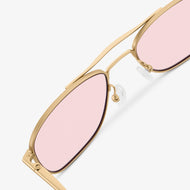 
Gold aviator-style eyeglasses with a double bridge and light pink tinted lenses, shown in a close rear angled view highlighting the double bridge and adjustable nose pads.