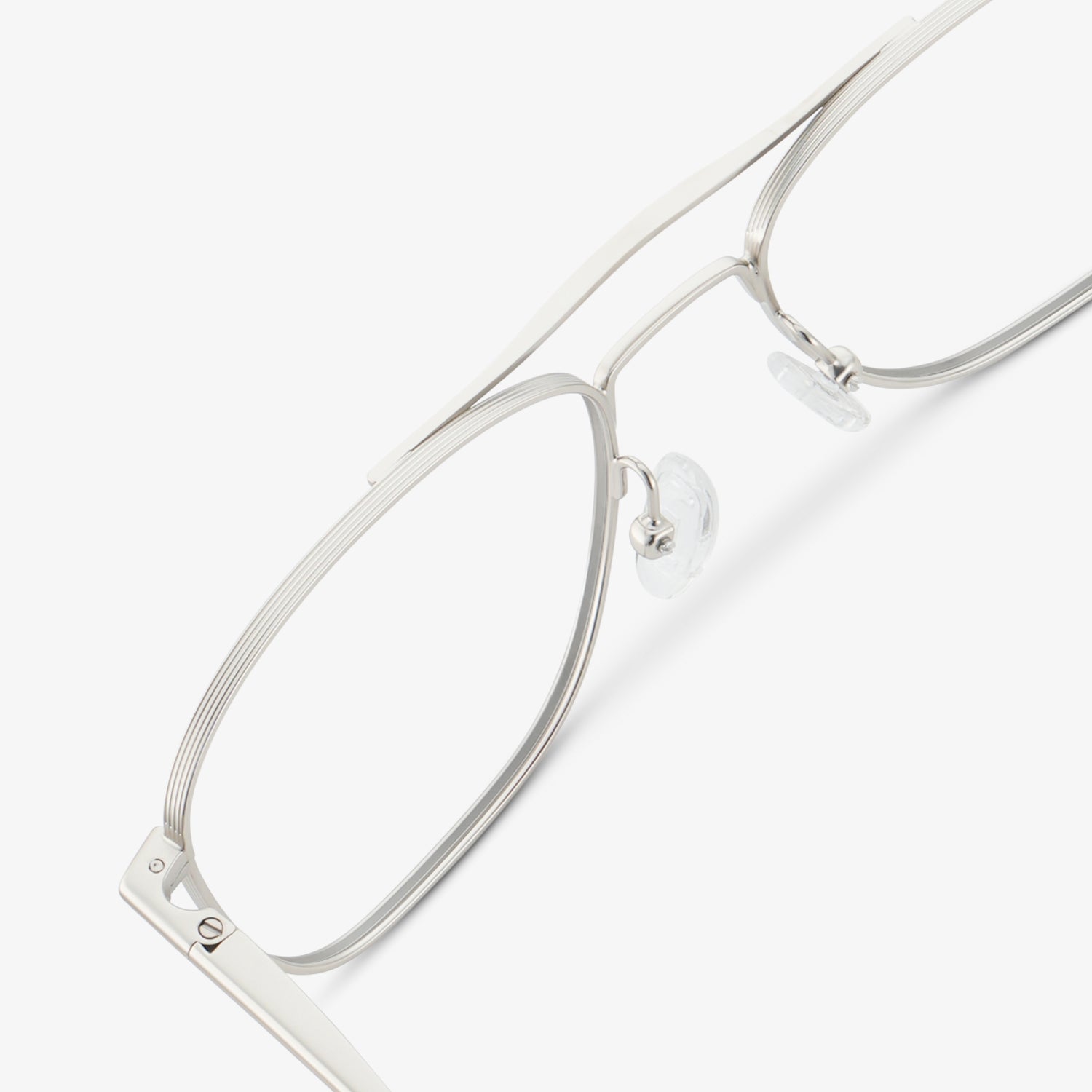 
Silver aviator-style eyeglasses with a double bridge and clear lenses, shown in a close rear angled view highlighting the double bridge and adjustable nose pads.