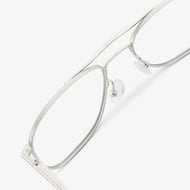 
Silver aviator-style eyeglasses with a double bridge and clear lenses, shown in a close rear angled view highlighting the double bridge and adjustable nose pads.