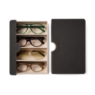 
Four pairs of glasses are shown: green round frames, dark tortoiseshell cat eye frames, gold aviators with yellow lenses, and brown square frames.