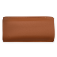 
Tan vegan leather eyeglass case with rounded edges, stitched seams, and embossed logo.