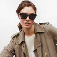 LA40XTOR10, LA40XTOR15, LA40XTOR20, LA40XTOR25 - Square tortoise frames with dark tinted lenses worn by a person.